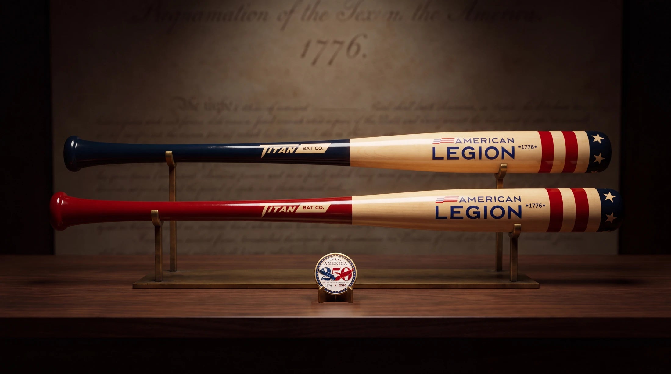 Red and blue Titan American Legion anniversary bats displayed together with their commemorative coin